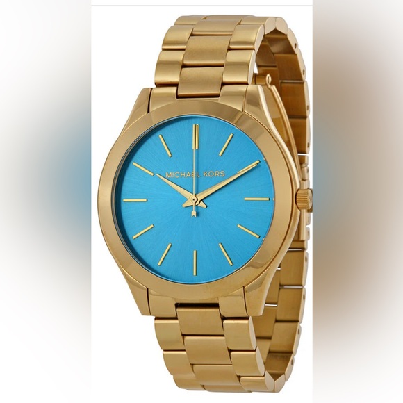 Michael Kors gold watch with blue face. - Picture 1 of 7